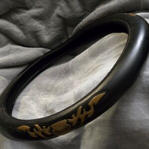 Black Steering Wheel Cover with Gold Skull Accents